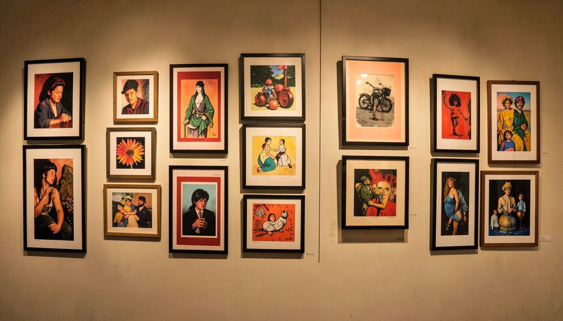 A gallery wall filled with framed screenprints in varied styles, warm gallery lighting casting soft shadows